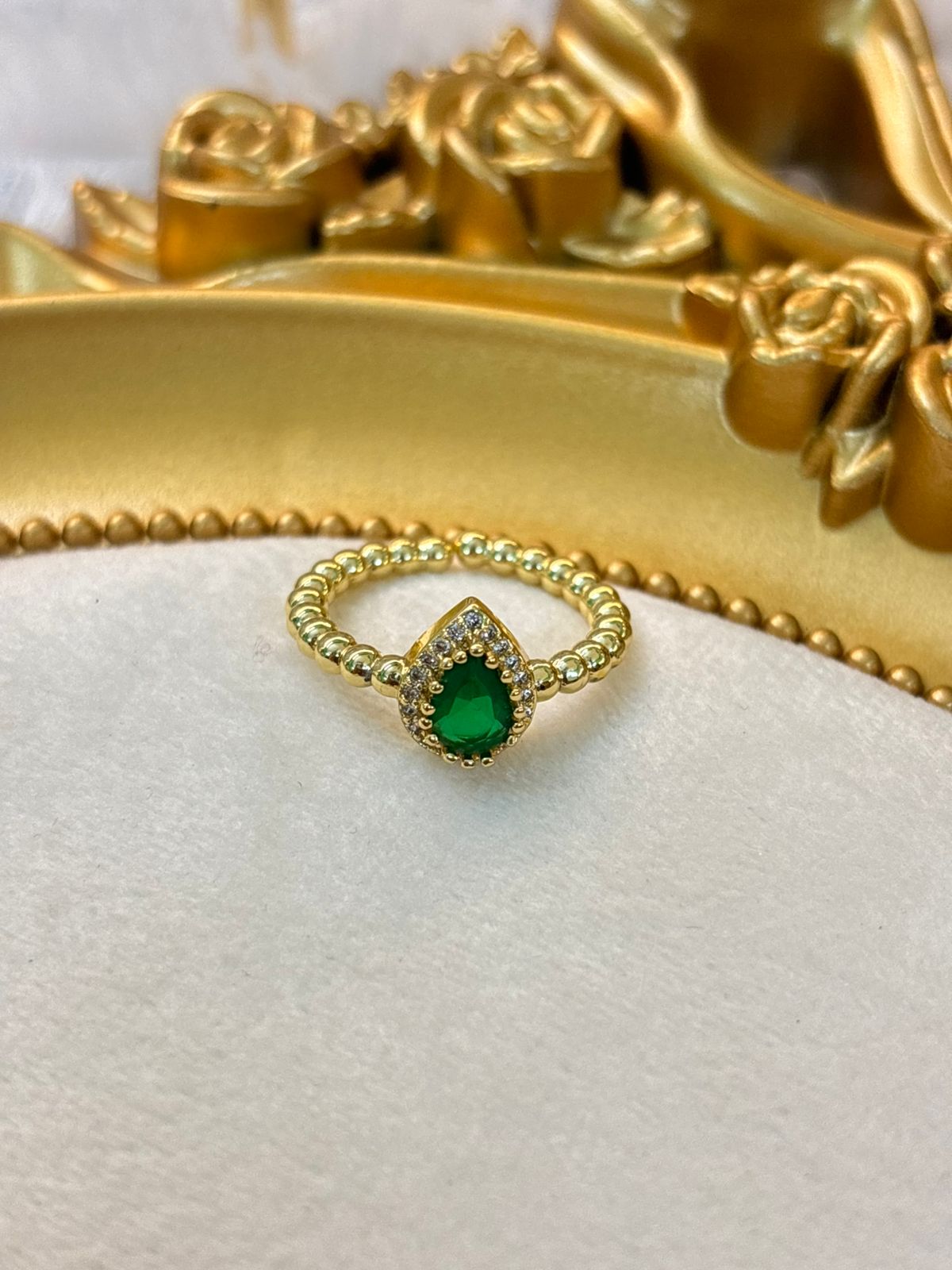 Green drop ring 108
